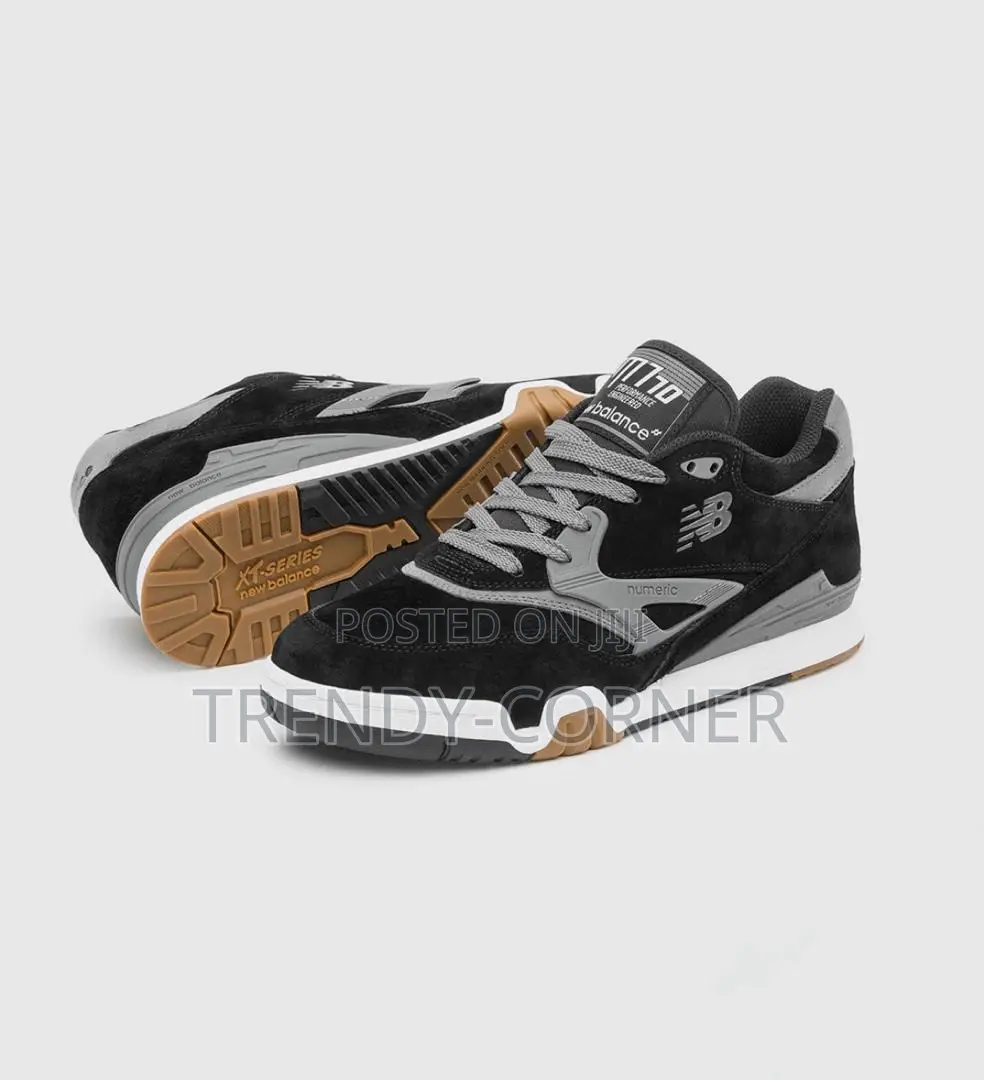 New Balance Numeric 770 in the "Black / Grey" Colorway.