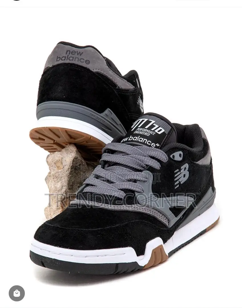 New Balance Numeric 770 in the "Black / Grey" Colorway.