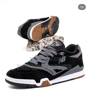 New Balance Numeric 770 in the "Black / Grey" Colorway.
