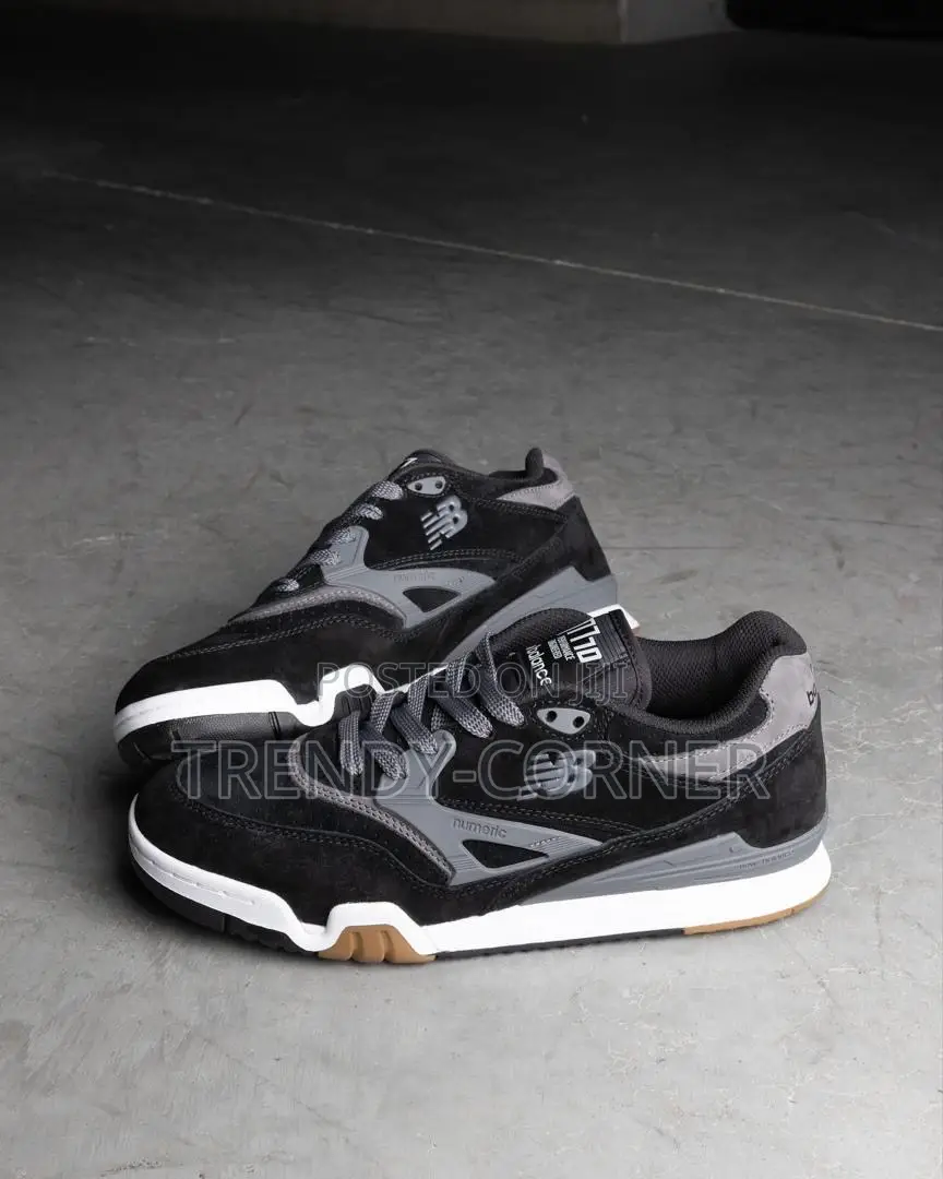 New Balance Numeric 770 in the "Black / Grey" Colorway.
