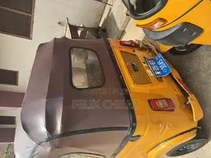 Bajaj RE 2025 Yellow
