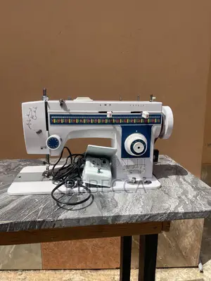 Slightly Used Butterfly Sewing Machine