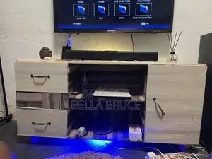 Barely Used Wood Made Tv Stand With Drawers Very Strong