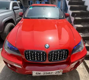 BMW X6 xDrive35i 4x4 Coupe (3.0L 6cyl 8A) 2013 Orange