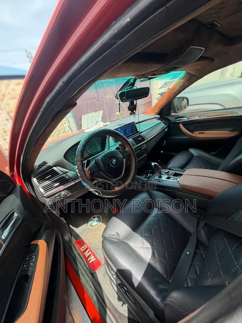 BMW X6 xDrive35i 4x4 Coupe (3.0L 6cyl 8A) 2013 Orange