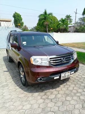 Honda Pilot Touring w/RES/Navi 4WD (3.5L 6cyl 5A) 2012 Burgundy