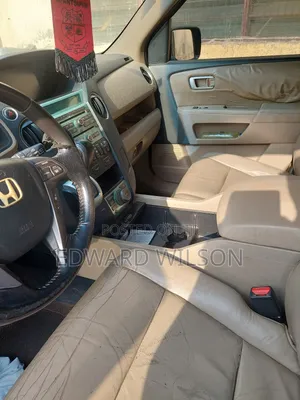 Honda Pilot Touring w/RES/Navi 4WD (3.5L 6cyl 5A) 2010 Black