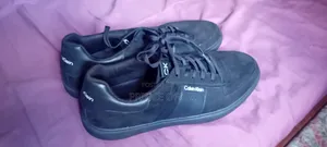 Very Neat Calvin Klein With No Damage and Can Be Worn Anywhere,Size 47