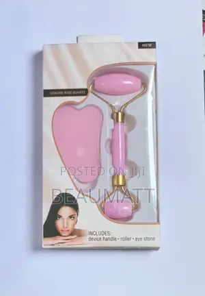 Rose Quartz Facial + Derma Roller System In Its Packaging