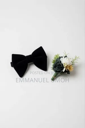 Classic Velvet Butterfly Bow Tie and Beautiful Groom's Boutonniere