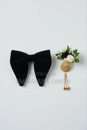 Classic Velvet Butterfly Bow Tie and Beautiful Groom's Boutonniere