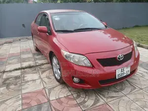 Toyota Corolla Base 4dr Sedan (1.8L 4cyl 5M) 2009 Red