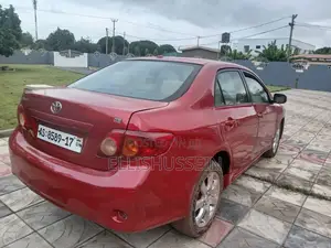 Toyota Corolla Base 4dr Sedan (1.8L 4cyl 5M) 2009 Red