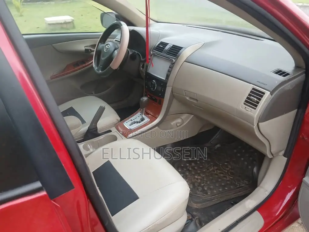 Toyota Corolla Base 4dr Sedan (1.8L 4cyl 5M) 2009 Red