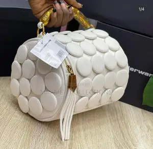Alexander Wang Button-Textured Cylindrical Barrel Ladies Handbag