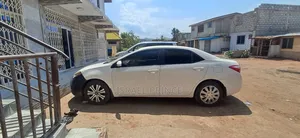 Toyota Corolla L 4dr Sedan (1.8L 4cyl 4A) 2015 White