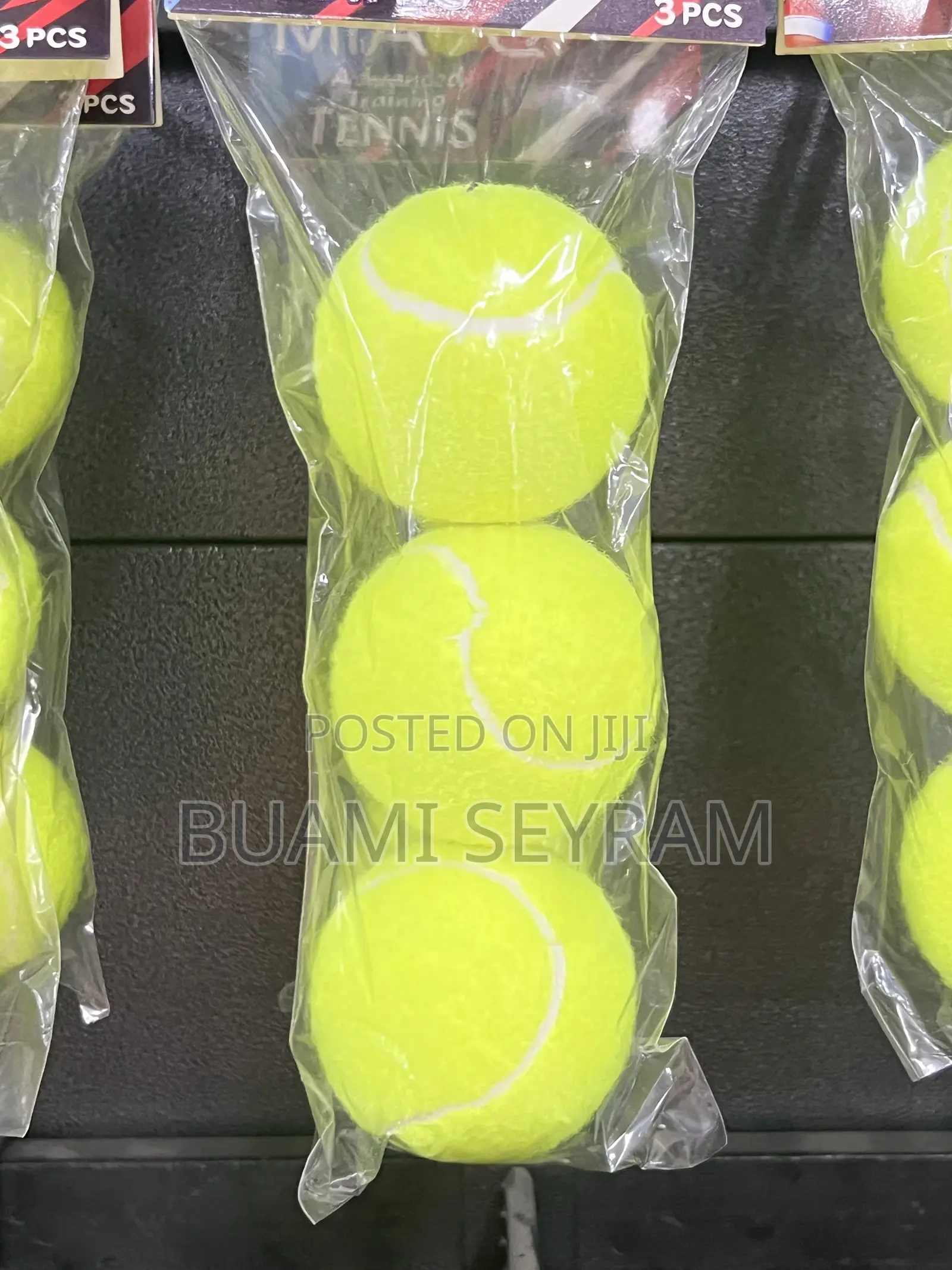 Three Packed Lawn Tennis Balls