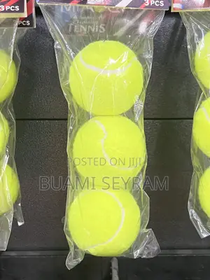 Three Packed Lawn Tennis Balls