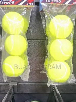 Three Packed Lawn Tennis Balls