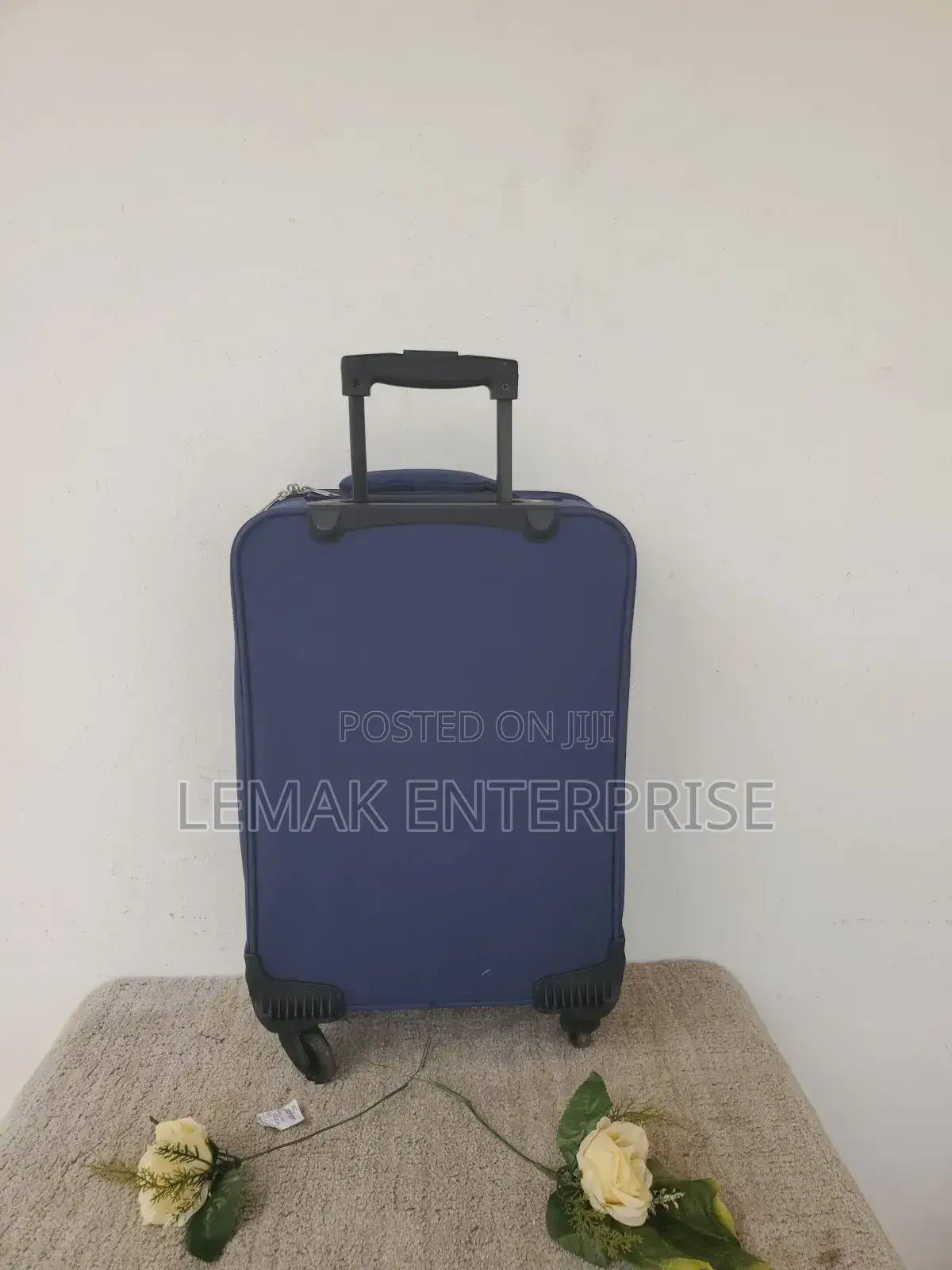 Featherstone 4-Wheel Soft Suitcase/ Traveling Bag. Color Navy Blue.