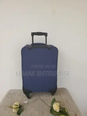Featherstone 4-Wheel Soft Suitcase/ Traveling Bag. Color Navy Blue.