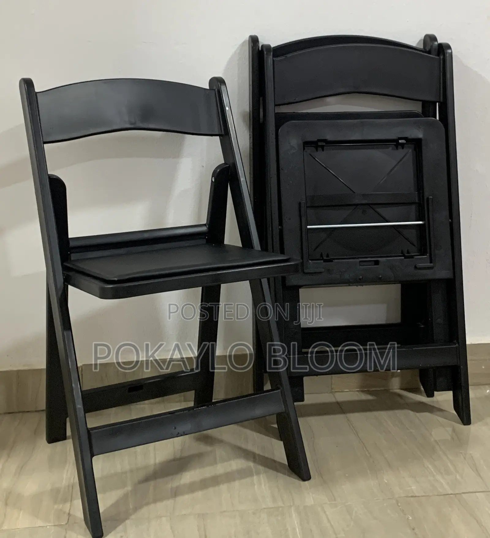 Matte Black and Matte White Resin Folding Chairs With Padded Seats