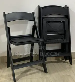 Matte Black and Matte White Resin Folding Chairs With Padded Seats