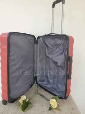 Featherstone Hard-Shell/ Traveling Suitcase . Red Color
Medium Size