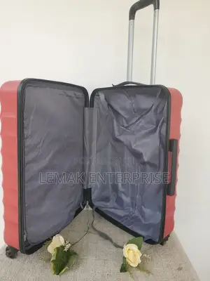 Featherstone Hard-Shell/ Traveling Suitcase . Red Color
Medium Size
