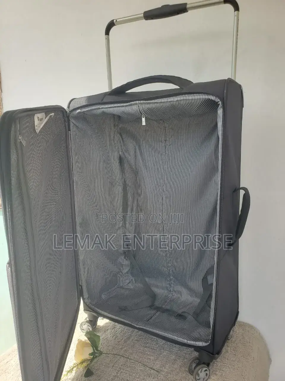 Black and Grey Softside Spinner Luggage