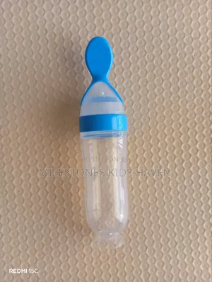 Baby Squeeze Spoon Feeding Bottle