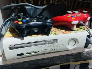 Xbox 360 With Two Controllers and 5 Video Games for Sale