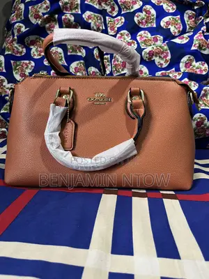 Coach Bags, Hermes Slippers and Nike Slides