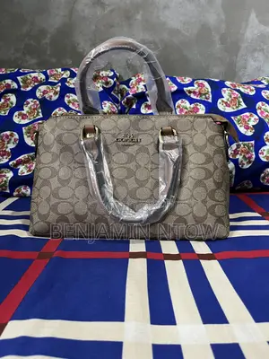 Coach Bags, Hermes Slippers and Nike Slides