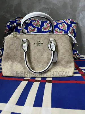 Coach Bags, Hermes Slippers and Nike Slides