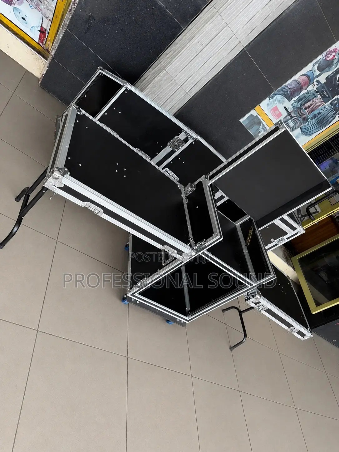 Black Dj Flight Case With Aluminum Reinforcement and Wheels.