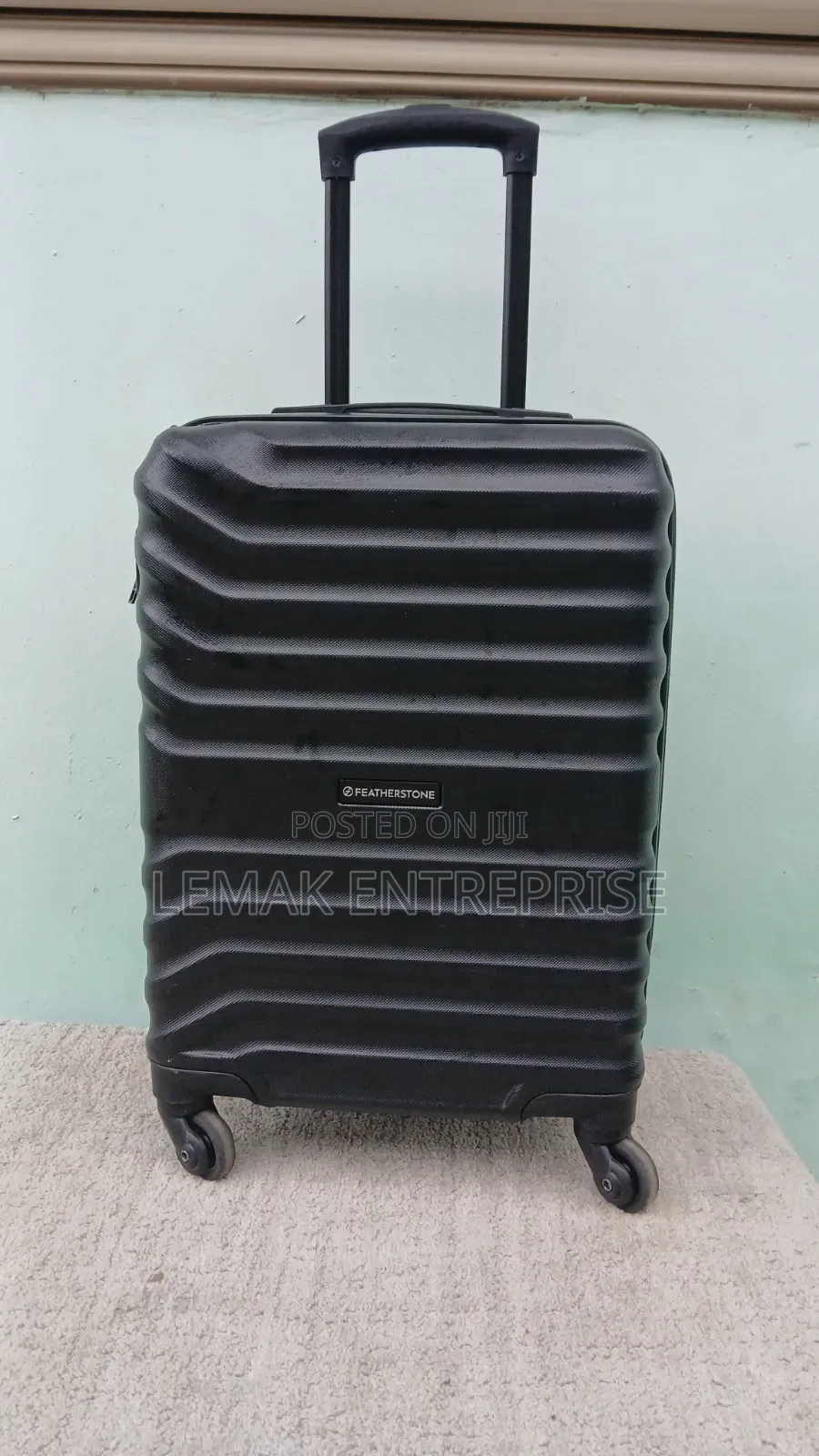 Featherstone 4-Wheel Hard Traveling Suitcase
