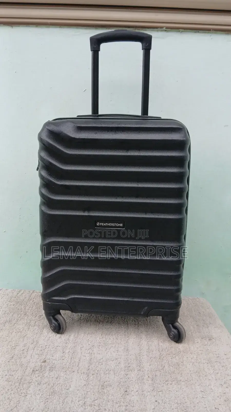 Featherstone 4-Wheel Hard Traveling Suitcase