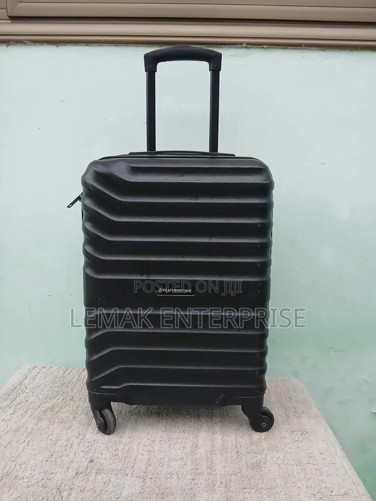 Featherstone 4-Wheel Hard Traveling Suitcase