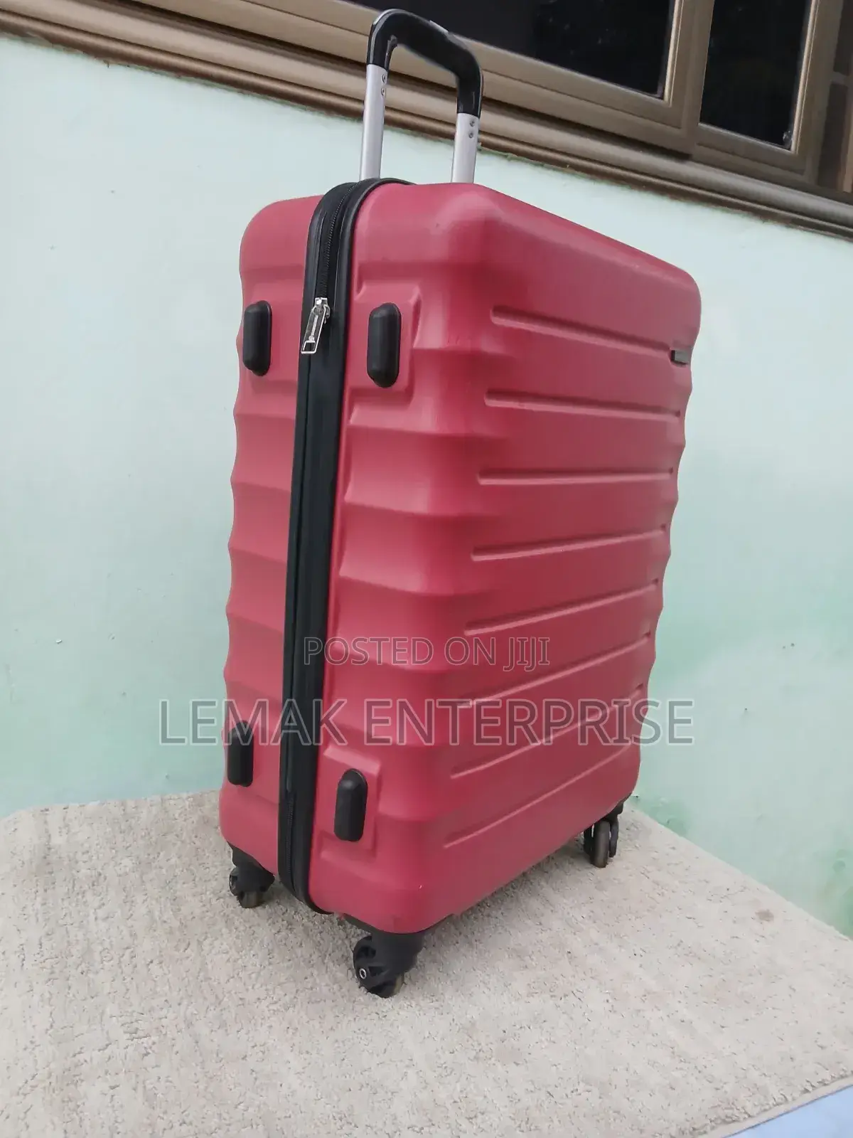 Featherstone Hard-Shell/ Traveling Suitcase . Red Color
Medium Size