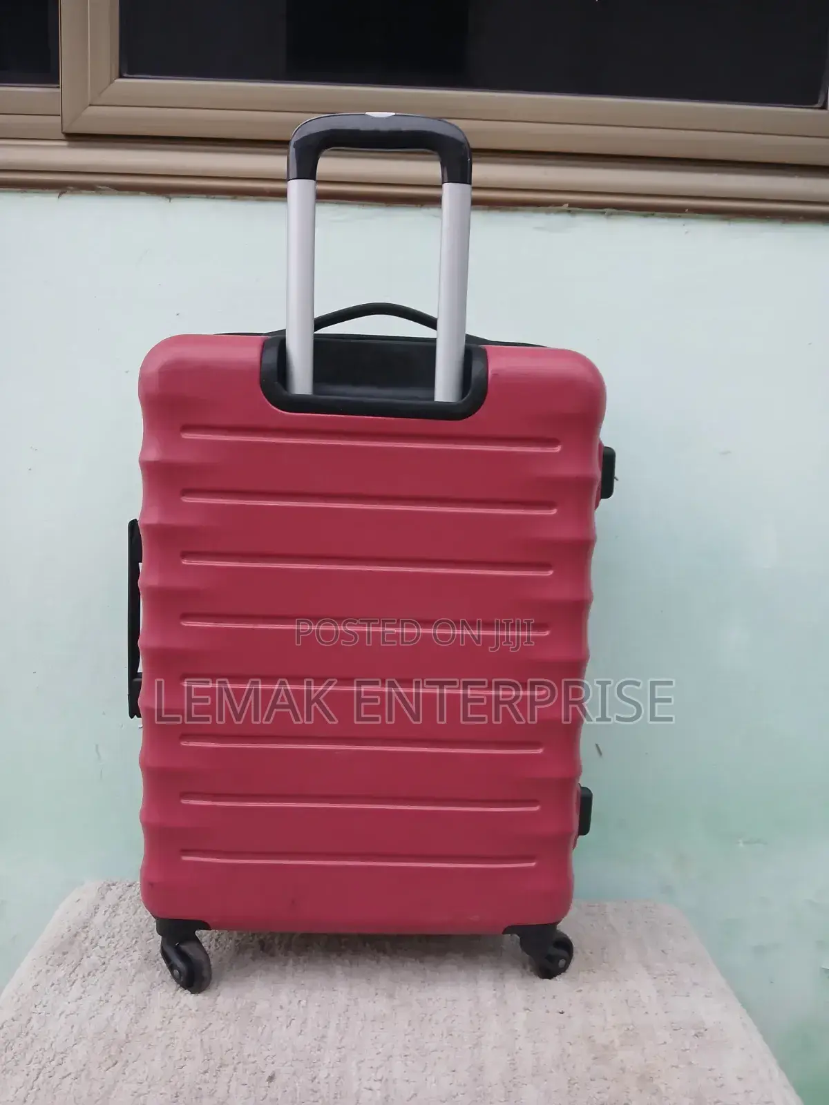 Featherstone Hard-Shell/ Traveling Suitcase . Red Color
Medium Size