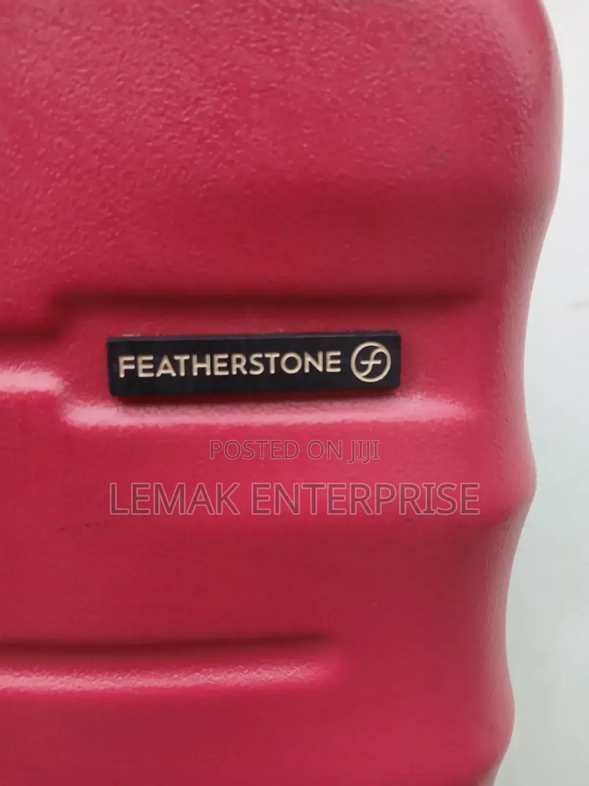 Featherstone Hard-Shell/ Traveling Suitcase . Red Color
Medium Size