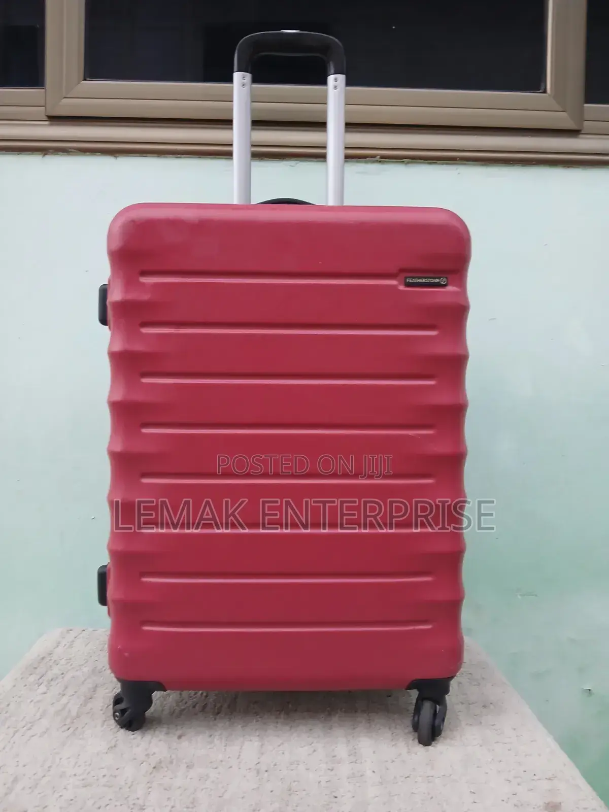Featherstone Hard-Shell/ Traveling Suitcase . Red Color
Medium Size