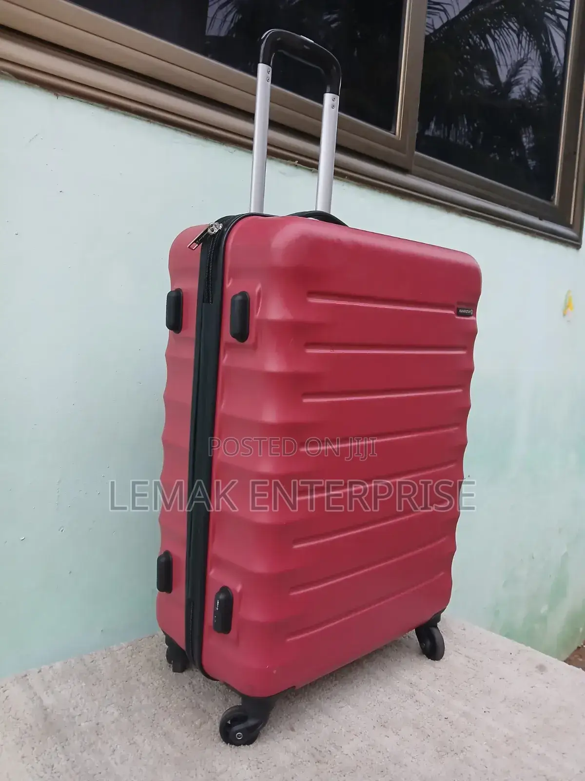 Featherstone Hard-Shell/ Traveling Suitcase . Red Color
Medium Size
