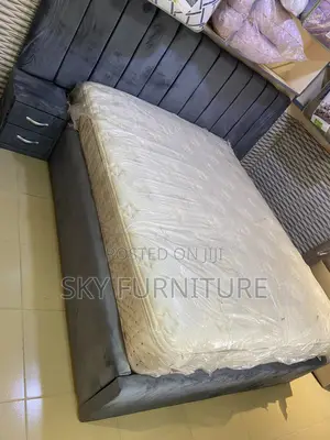 Oversized Double Bed With a Mattress Side Drawers