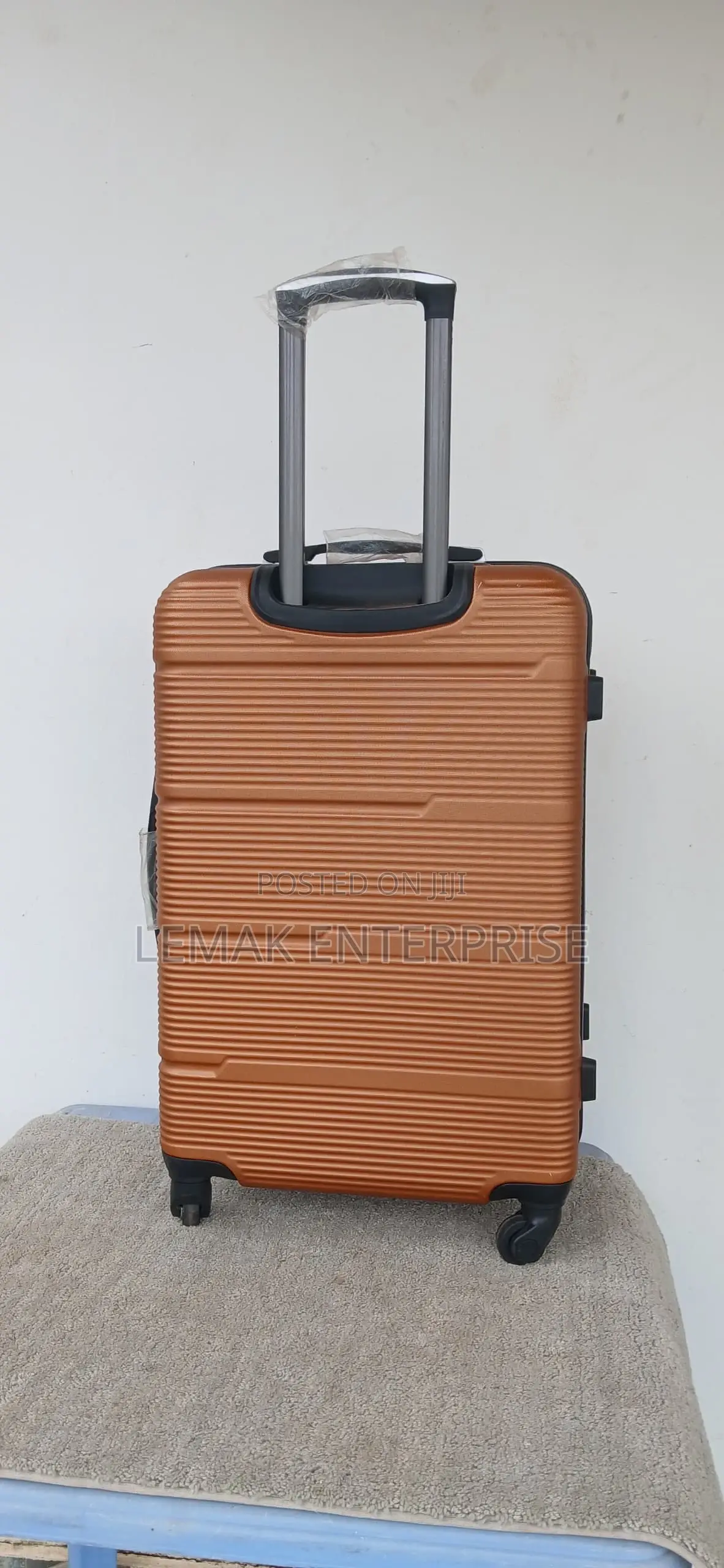 Hardshell Spinner Traveling Suitcase – Copper/Bronze Color.
