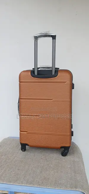 Hardshell Spinner Traveling Suitcase – Copper/Bronze Color.