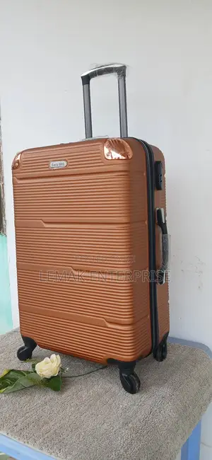 Hardshell Spinner Traveling Suitcase – Copper/Bronze Color.