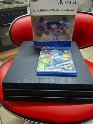 Play Station 4 Pro With Two Games