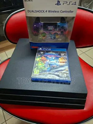 Play Station 4 Pro With Two Games